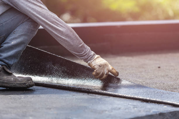 Professional Basement Waterproofing technician working in Morrisville, PA